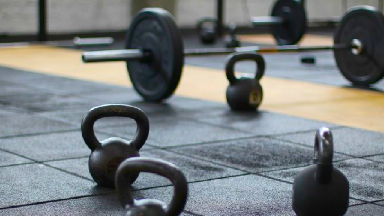 Barbells vs. Kettlebells The Ultimate Combo for Fitness